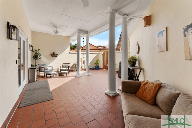 view of patio / terrace featuring ceiling fan