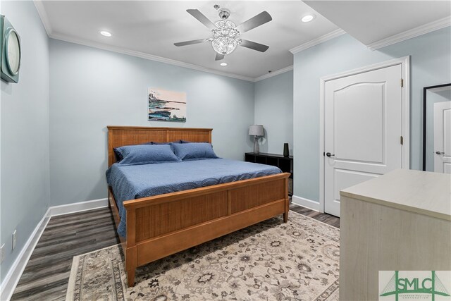 bedroom featuring ornamental molding, ceiling fan, and dark hardwood / wood-style floors