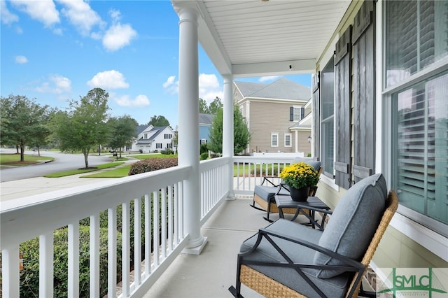 balcony featuring covered porch