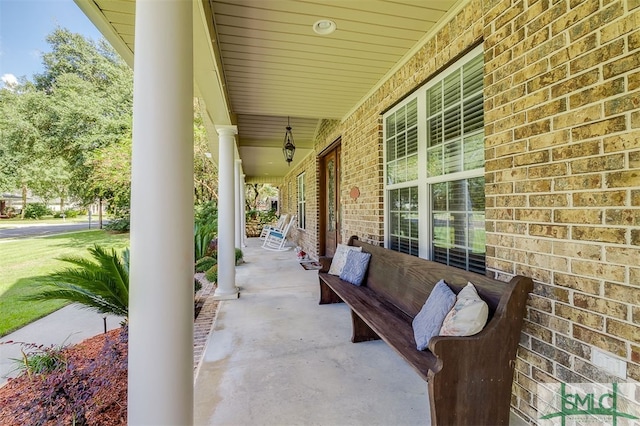 view of patio featuring a porch