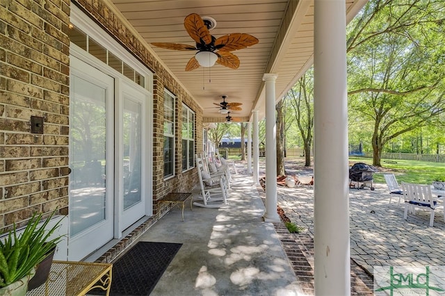 view of patio featuring ceiling fan