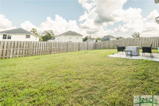 view of yard with a patio area