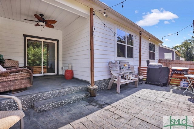 view of patio / terrace with ceiling fan and grilling area