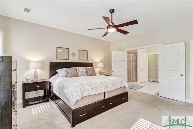 bedroom featuring ceiling fan and light colored carpet