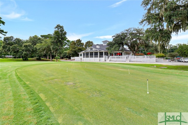 view of yard with a sunroom