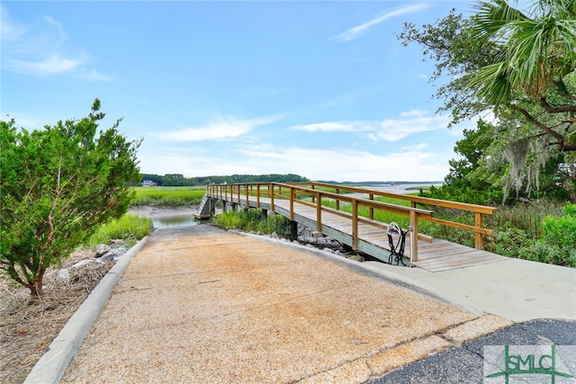 view of home's community featuring a water view