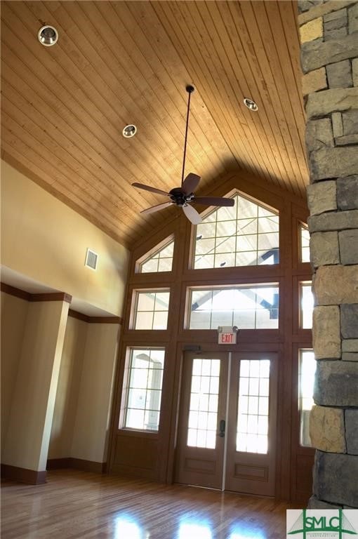 details with wooden ceiling, wood-type flooring, and ceiling fan