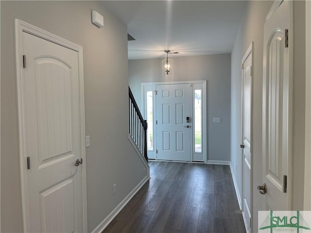 244 Brookline Dr, Savannah, GA 31407 - entrance foyer featuring baseboards, stairway, and dark wood-style flooring