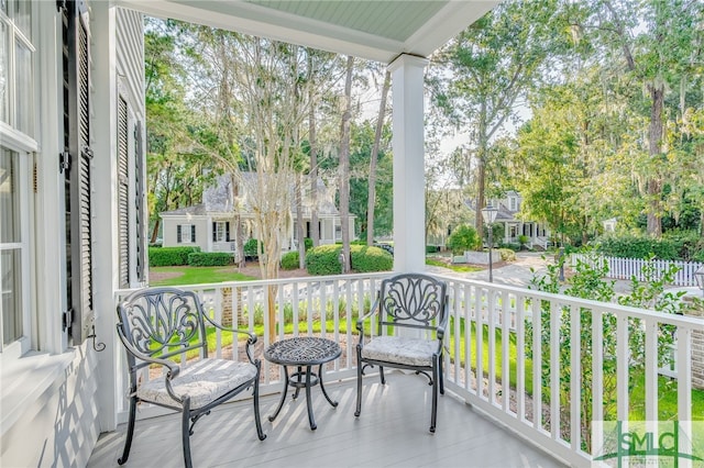 balcony featuring covered porch