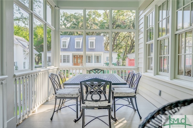 sunroom / solarium with plenty of natural light