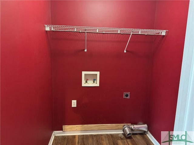 laundry area featuring washer hookup, electric dryer hookup, and wood-type flooring