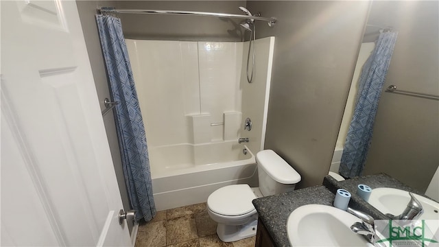 full bathroom with toilet, shower / tub combo, and vanity