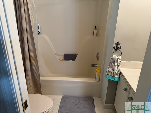 full bathroom featuring tile patterned flooring, vanity, shower / bath combo, and toilet