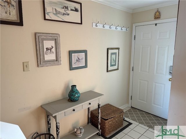 entryway featuring light tile patterned flooring and ornamental molding