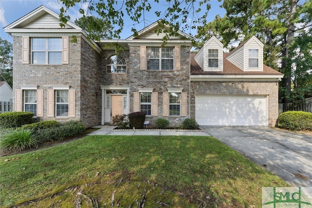 view of front facade with a garage and a front yard