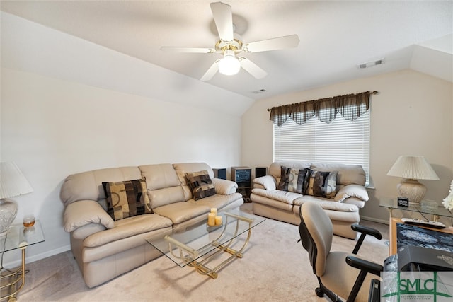 carpeted living room featuring ceiling fan and lofted ceiling