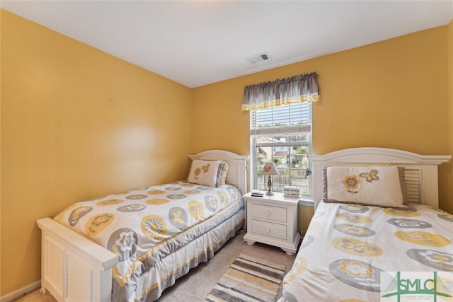 bedroom featuring carpet flooring