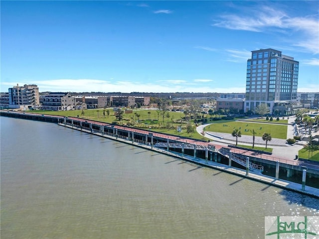 birds eye view of property featuring a water view