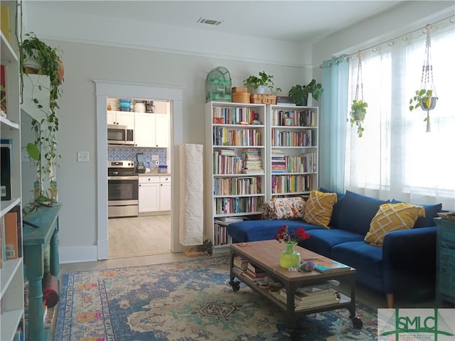 sitting room featuring light wood-type flooring