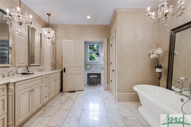 bathroom with vanity, ornamental molding, tasteful backsplash, and a tub