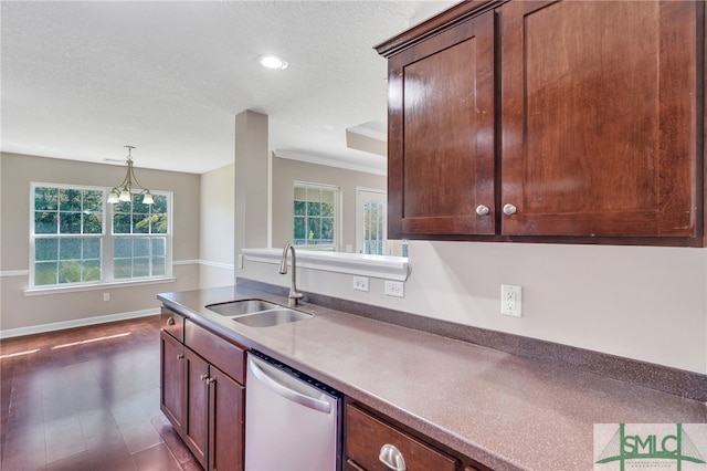 kitchen with dark hardwood / wood-style flooring, stainless steel dishwasher, ornamental molding, sink, and a chandelier