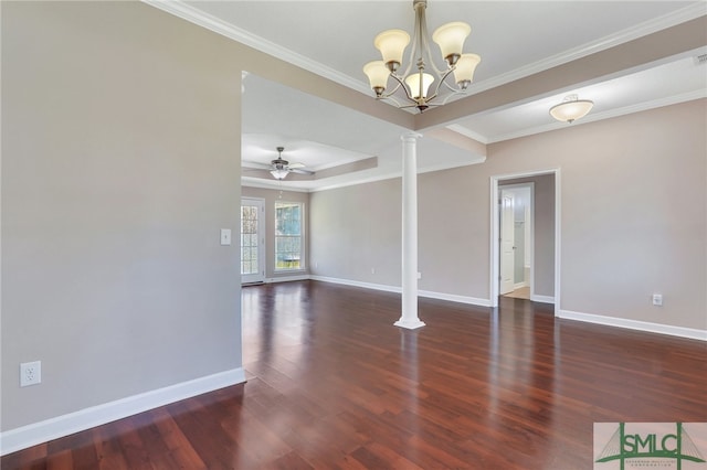 empty room with ceiling fan with notable chandelier, decorative columns, dark wood-type flooring, and crown molding