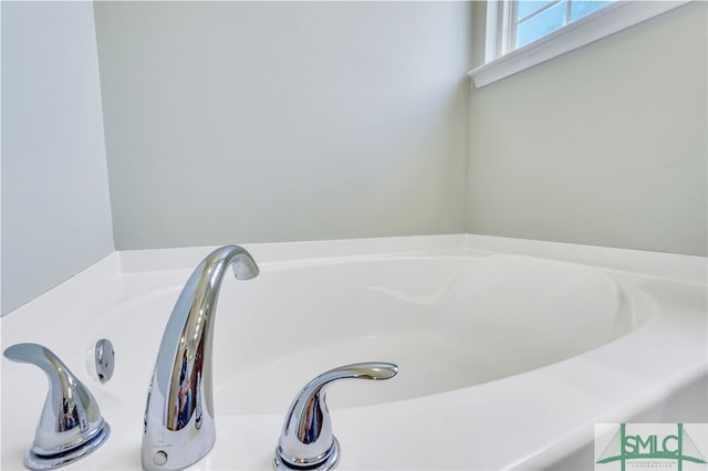 bathroom featuring a tub to relax in