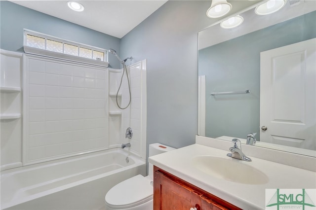 full bathroom featuring shower / bathing tub combination, vanity, and toilet