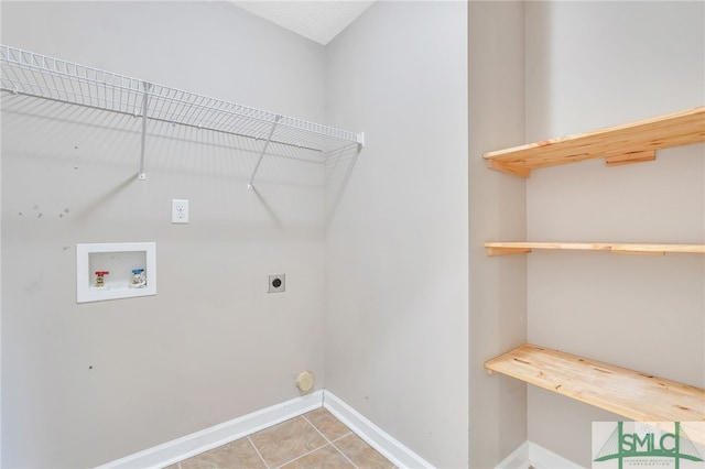 laundry area with washer hookup, tile patterned flooring, and electric dryer hookup