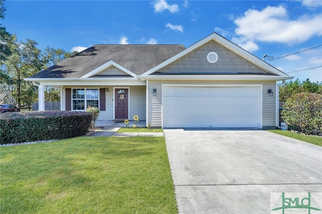 view of front facade with a front yard and a garage