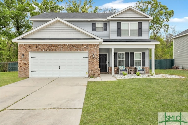 view of front facade featuring a garage, a porch, and a front lawn