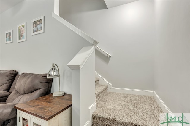 staircase with carpet