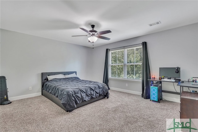 bedroom featuring ceiling fan and light colored carpet