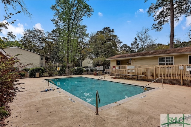 view of swimming pool featuring a patio