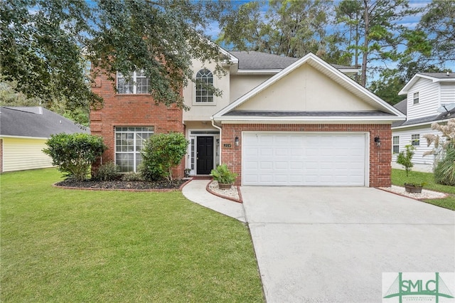 view of front of property featuring a garage and a front lawn