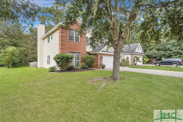 view of front of home with a garage and a front yard