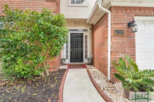 entrance to property with a garage