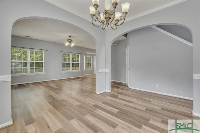 empty room with ornamental molding, light hardwood / wood-style floors, ceiling fan with notable chandelier, and a textured ceiling