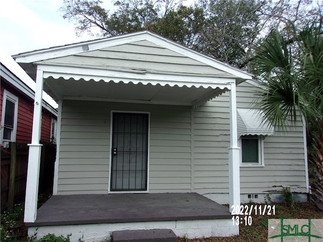 back of house featuring a patio area