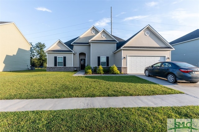 view of front facade featuring a garage and a front lawn