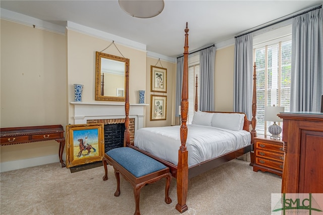 carpeted bedroom with ornamental molding