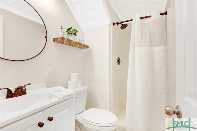 bathroom with a shower with curtain, vanity, toilet, and lofted ceiling