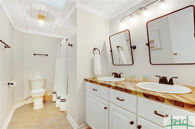 bathroom featuring vanity, tile patterned floors, toilet, ornamental molding, and walk in shower