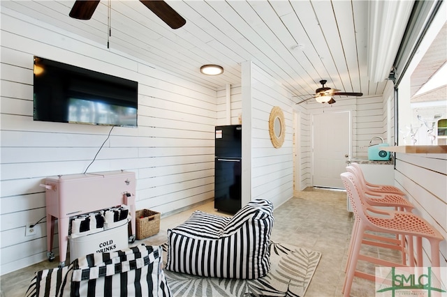 view of patio / terrace featuring ceiling fan