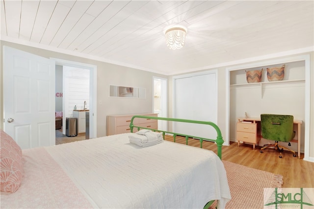 bedroom with light wood-type flooring