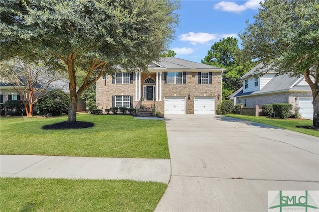 raised ranch with a front yard and a garage