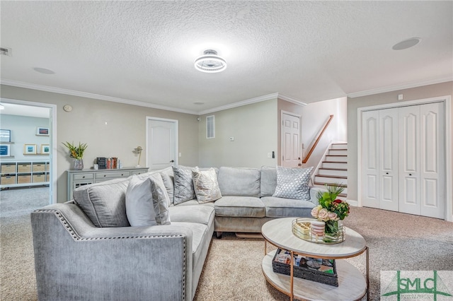 carpeted living room with a textured ceiling and crown molding