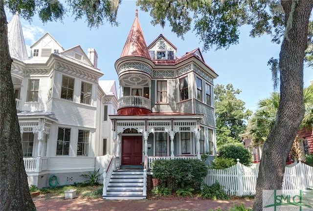 victorian-style house featuring a balcony