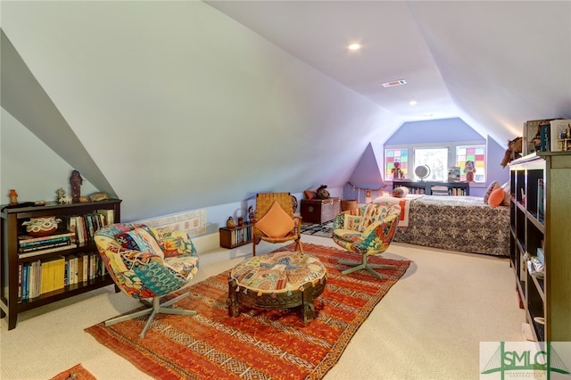 interior space featuring carpet floors and lofted ceiling