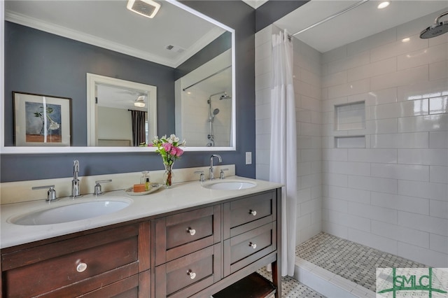 bathroom with crown molding, vanity, and a shower with curtain